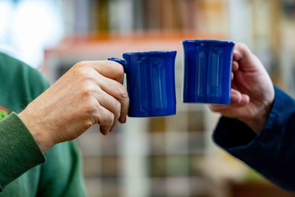 Image of mugs clinching