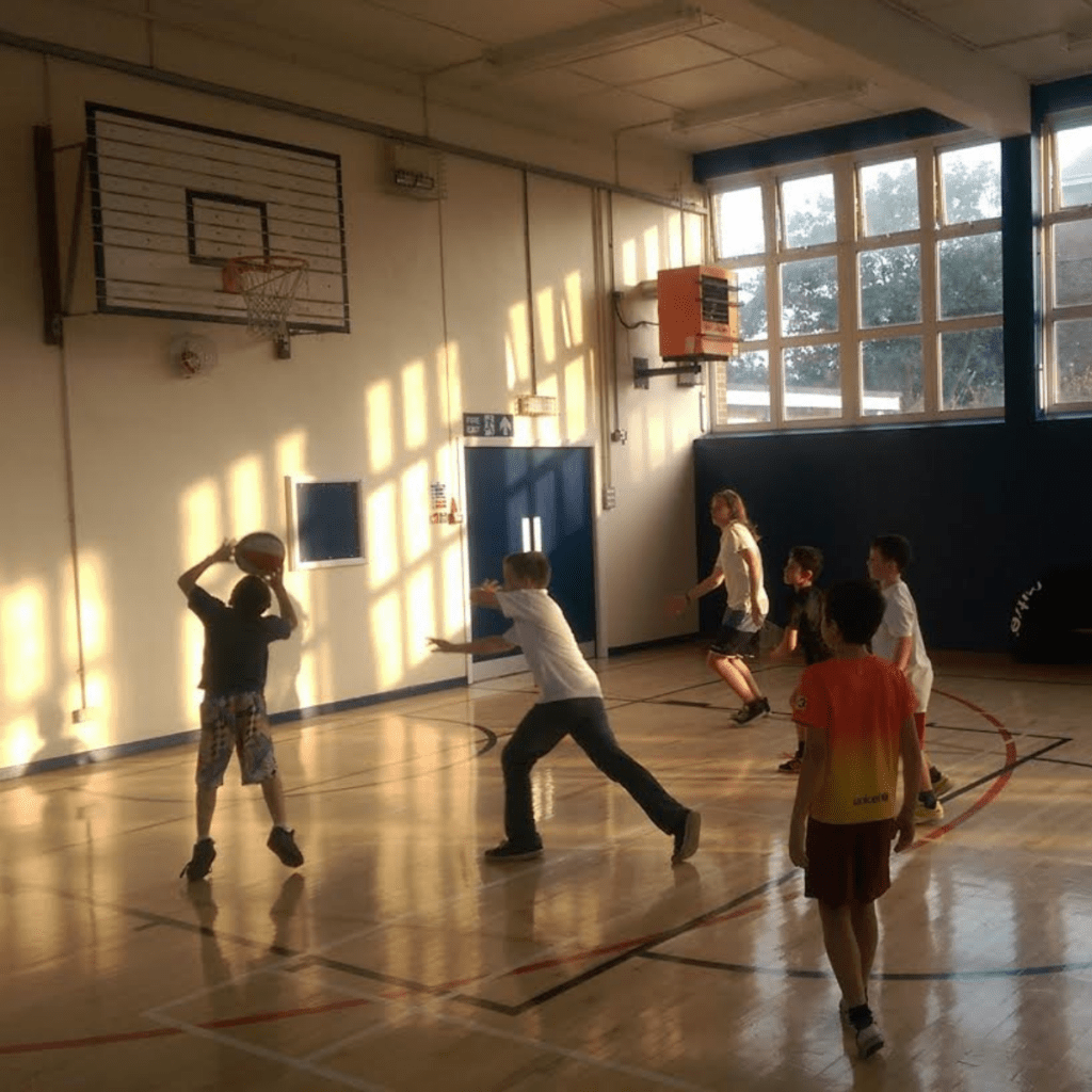 Young people playing basketball