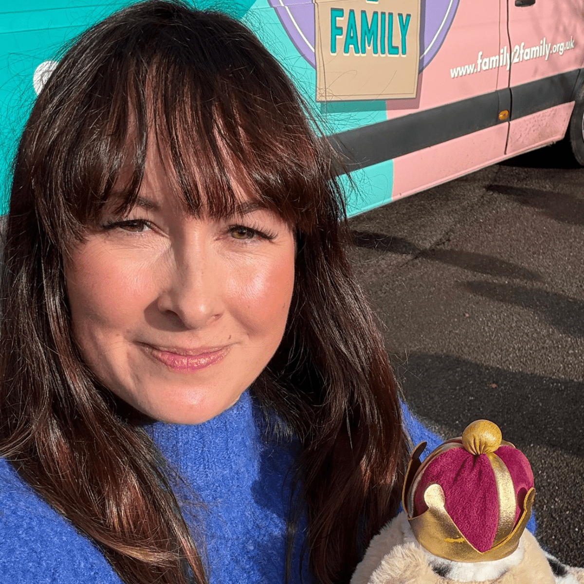 Hannah Powell holding a cuddly toy bear