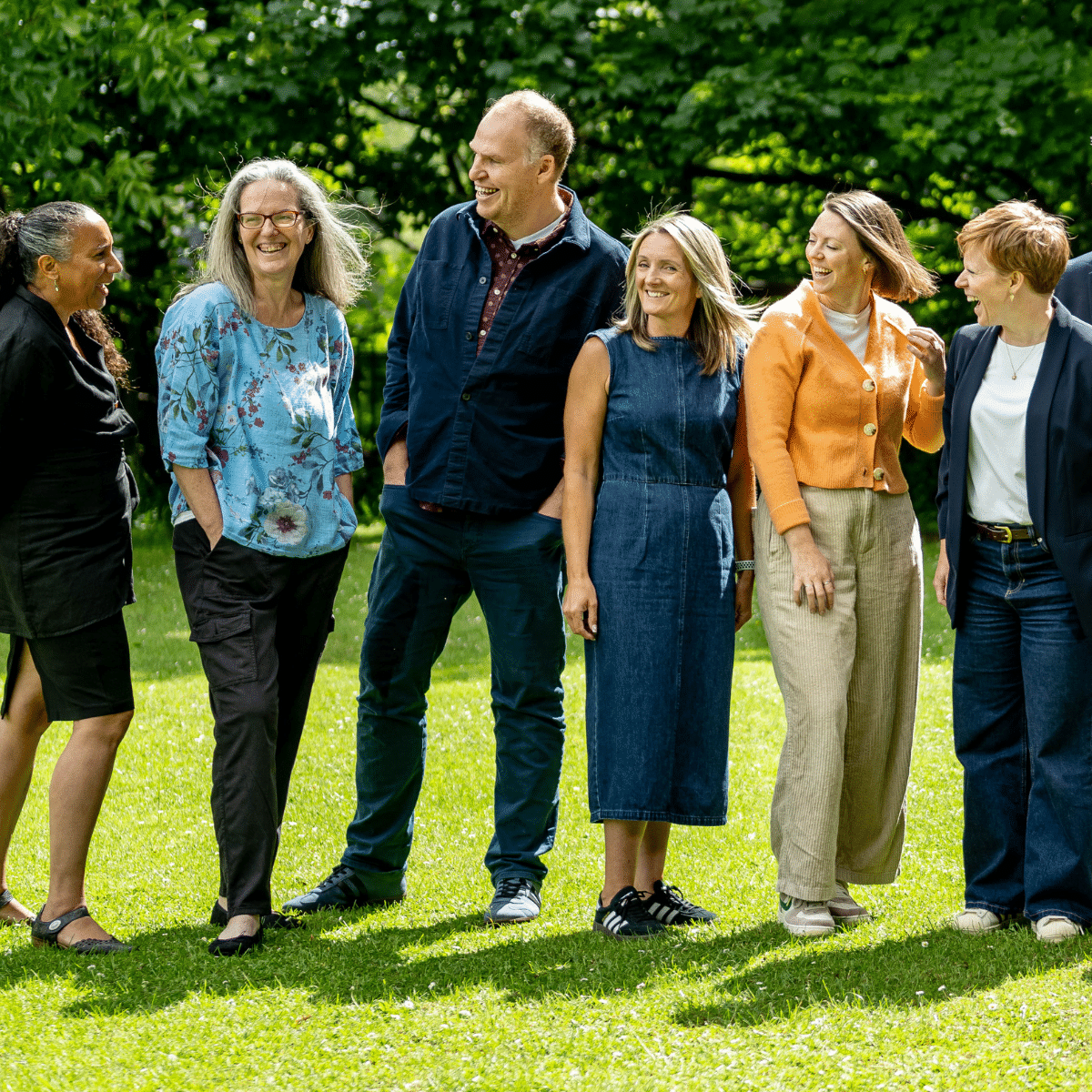 The staff team standing outside